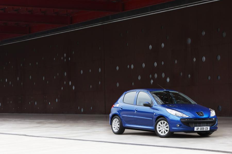 Peugeot 206 Plus 2009 года  (фото 40 из 49)